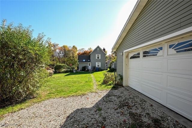 garage with a lawn