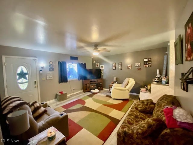 living room with ceiling fan