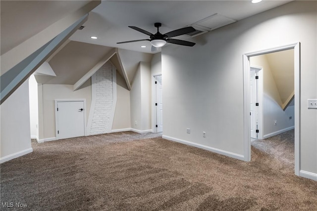 additional living space with ceiling fan, carpet floors, and lofted ceiling