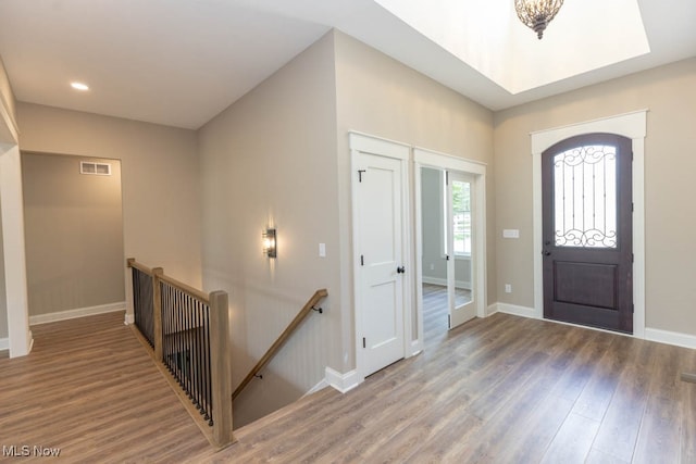 foyer entrance featuring hardwood / wood-style floors