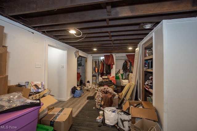 basement featuring hardwood / wood-style flooring