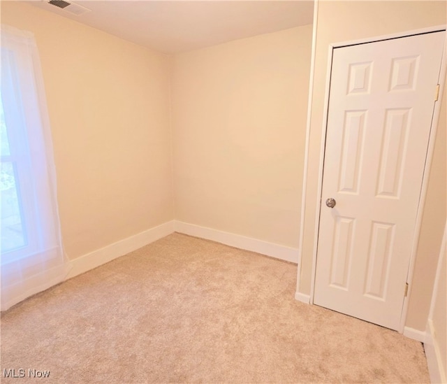 view of carpeted spare room