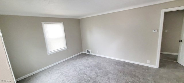 view of carpeted spare room