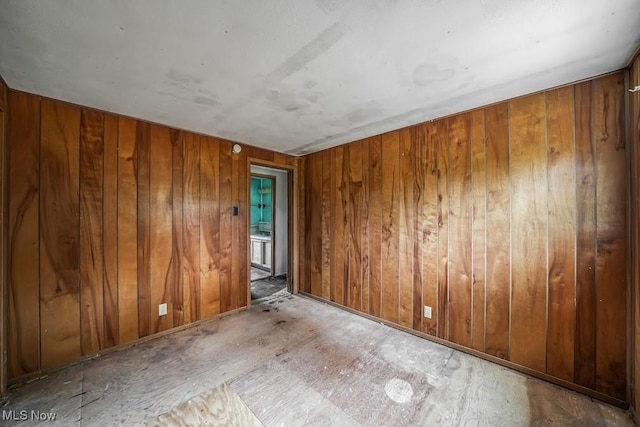 5552 Nelson Mosier Rd, Southington, OH 44470 - empty room with wood walls