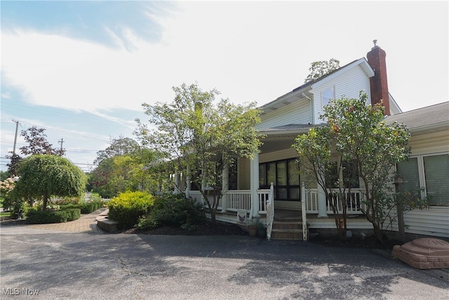 exterior space with a porch