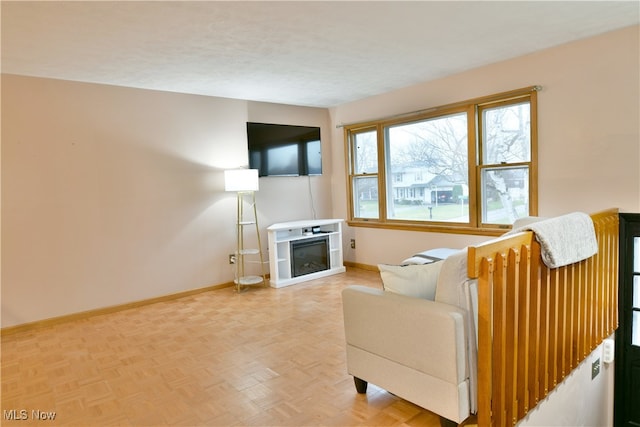 living room featuring parquet flooring