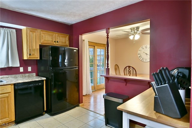 kitchen featuring light tile patterned floors, a textured ceiling, ceiling fan, and black appliances