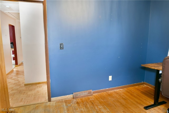 interior space featuring parquet floors