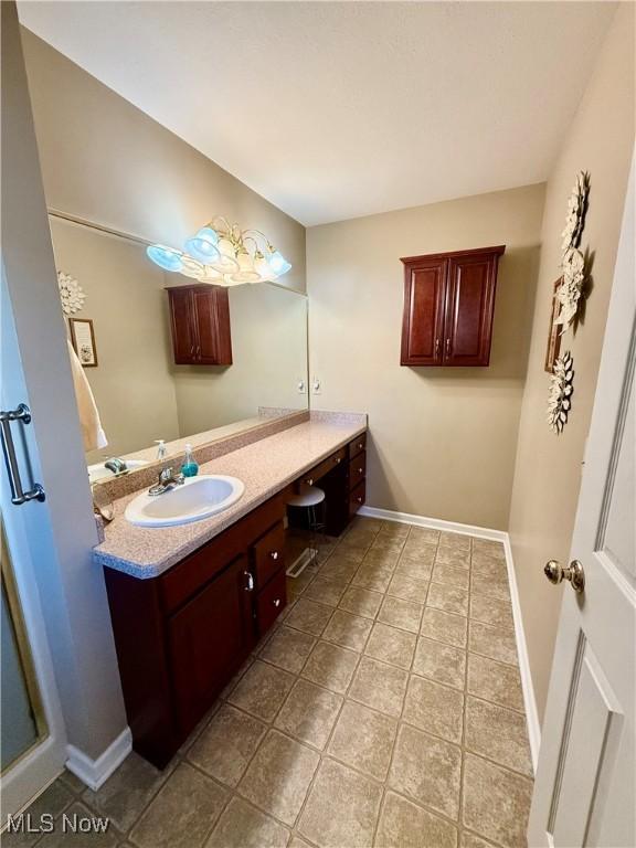 bathroom featuring vanity and tile patterned floors