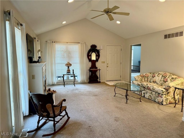 sitting room featuring carpet flooring, ceiling fan, and lofted ceiling