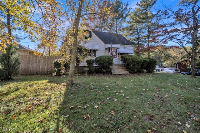 view of front facade with a front yard