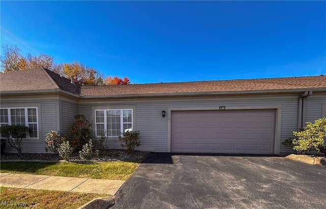 ranch-style house with a garage