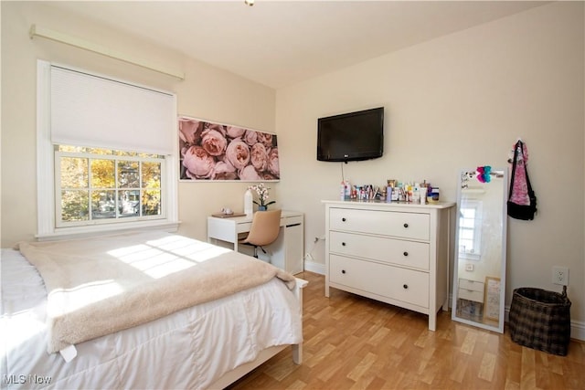 bedroom featuring light hardwood / wood-style floors