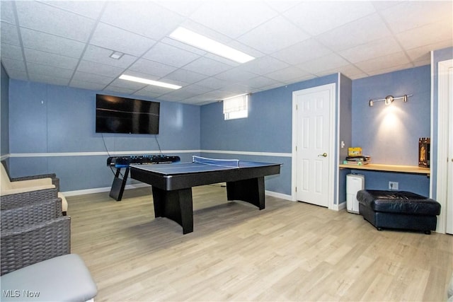 game room featuring light wood-type flooring