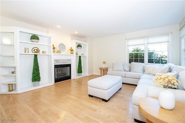 living room with light hardwood / wood-style floors