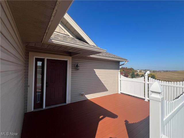 doorway to property featuring a wooden deck