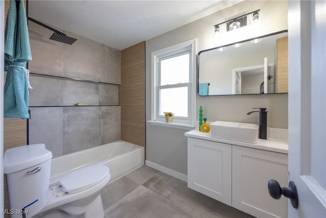 full bathroom featuring vanity, shower / washtub combination, a textured ceiling, and toilet