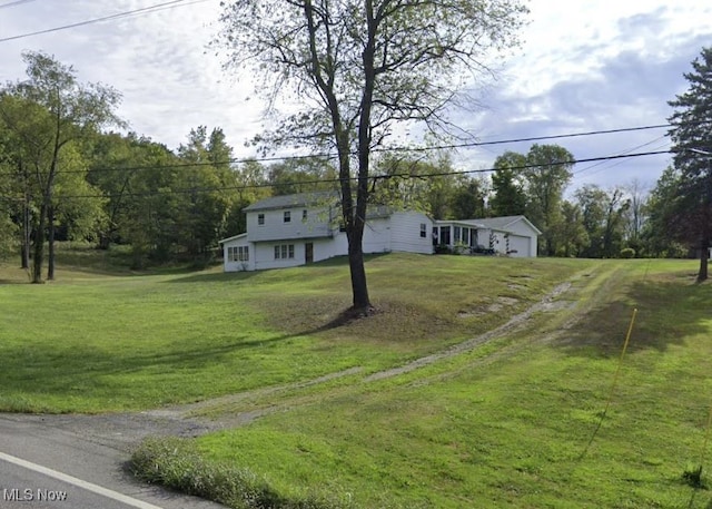 view of front of home with a front lawn