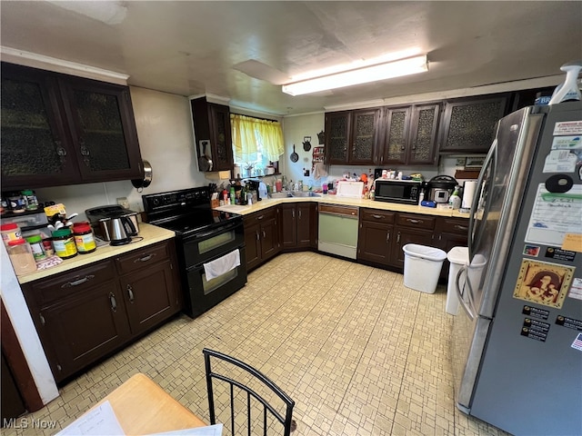 kitchen featuring sink, black appliances, and dark brown cabinets