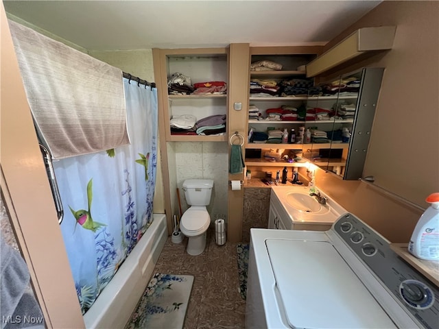 full bathroom with vanity, shower / bath combo, toilet, and washer / clothes dryer