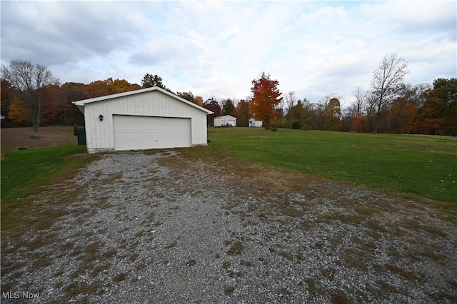 garage with a yard