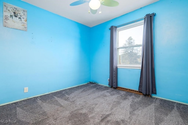 unfurnished room with carpet and ceiling fan