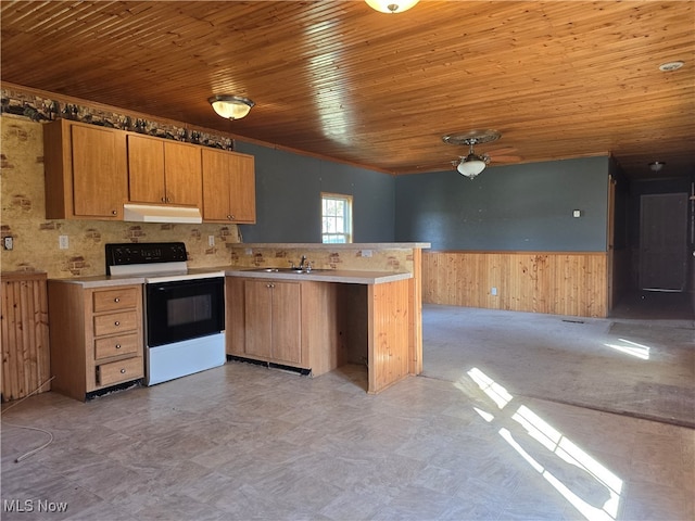 kitchen featuring white range with electric stovetop, wood walls, wooden ceiling, and kitchen peninsula