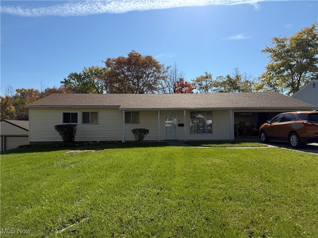 ranch-style house with a front lawn