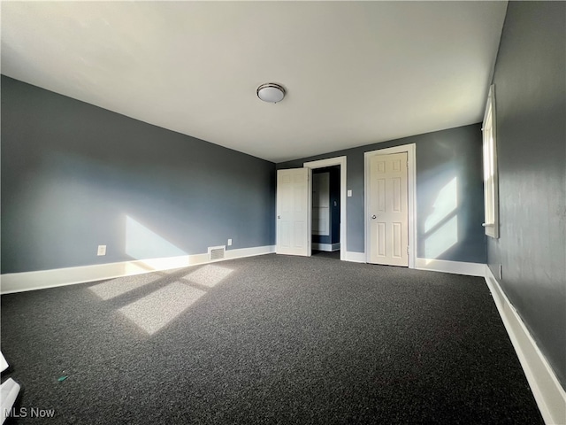 unfurnished bedroom with carpet floors