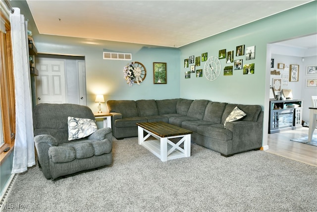 living room featuring carpet flooring