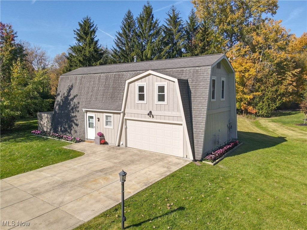 garage with a lawn