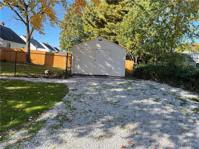 garage with a yard