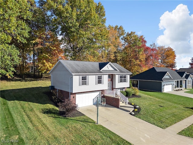 bi-level home with central AC, a front yard, and a garage