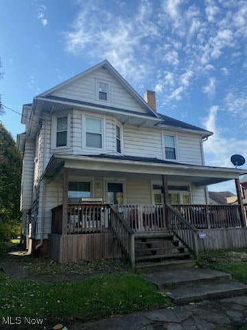 view of front of house with covered porch