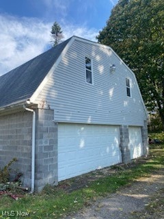 view of home's exterior featuring a garage