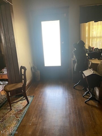 office area with dark wood-type flooring