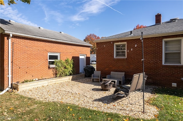 back of house featuring a patio area