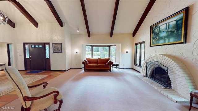 living room with high vaulted ceiling, beamed ceiling, and a fireplace