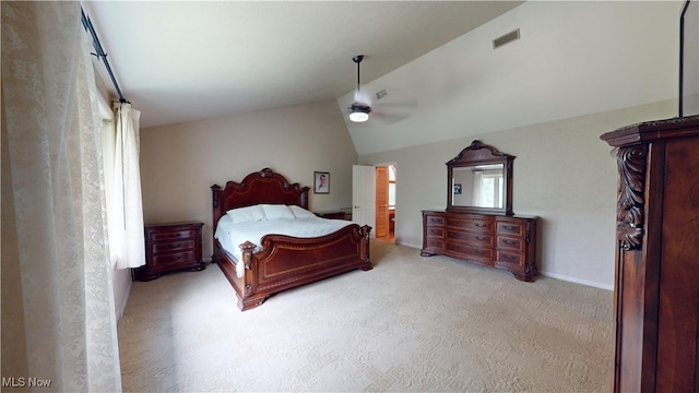 carpeted bedroom with ceiling fan and lofted ceiling