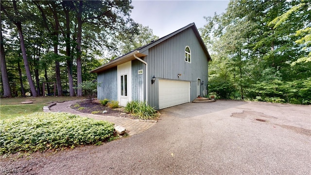 view of home's exterior with a garage