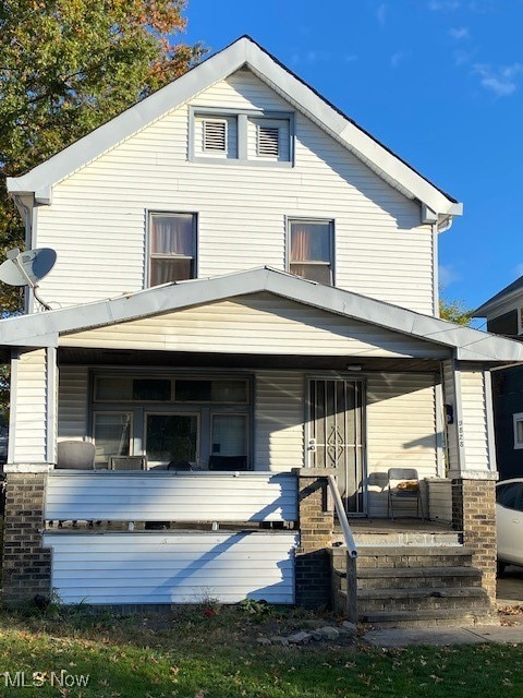 back of house with covered porch