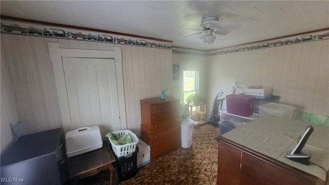 interior space featuring ceiling fan