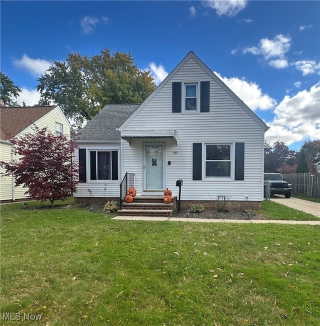 view of front of home with a front lawn