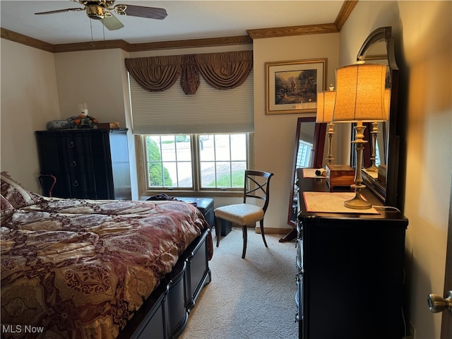 bedroom featuring ceiling fan, light carpet, and crown molding