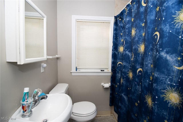 bathroom with toilet and sink