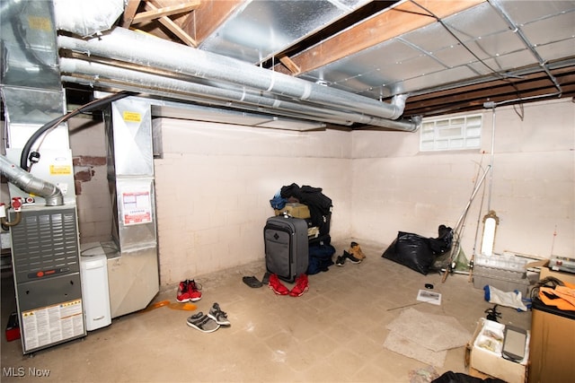 basement featuring heating unit