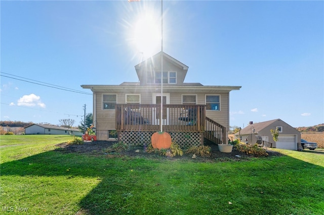 view of front of house featuring a front yard and a deck