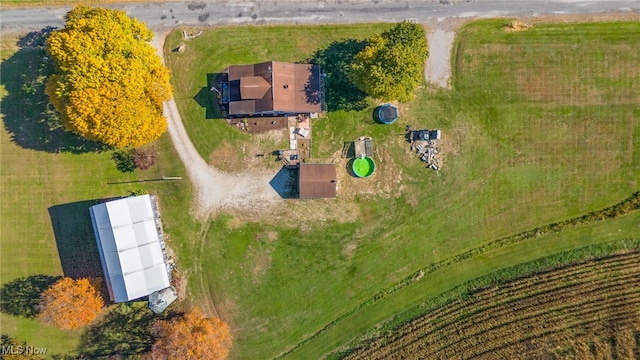 birds eye view of property with a rural view