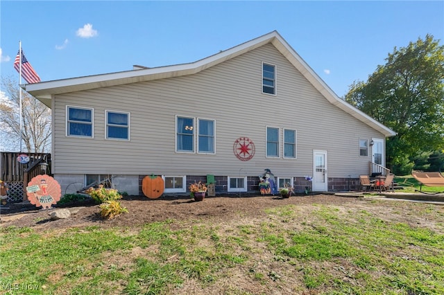 rear view of property featuring a patio