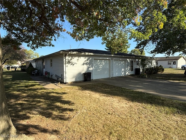 view of side of home featuring a lawn